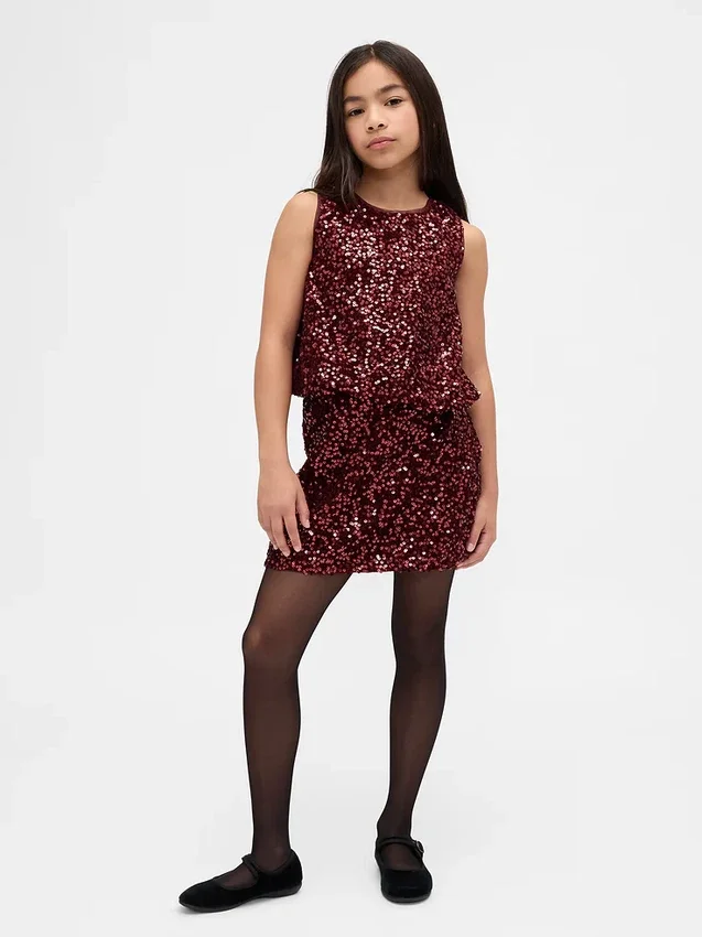 Blusa infantil con volantes y lentejuelas