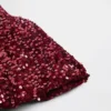 Blusa infantil con volantes y lentejuelas