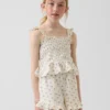 Blusa infantil de gasa de algodón con peplum fruncido