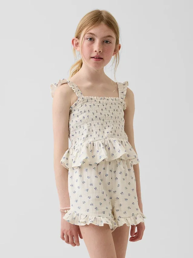 Blusa infantil de gasa de algodón con peplum fruncido