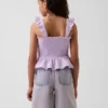 Blusa infantil de gasa de algodón con peplum fruncido