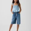 Blusa infantil de gasa de algodón con peplum fruncido