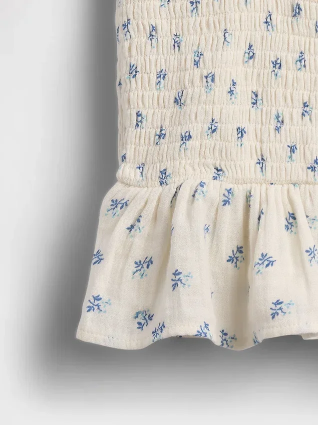 Blusa infantil de gasa de algodón con peplum fruncido