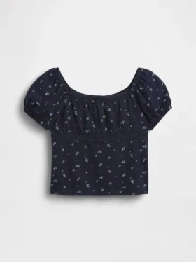 Blusa infantil de mangas abullonadas con ribete de encaje