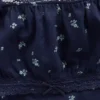Blusa infantil de mangas abullonadas con ribete de encaje