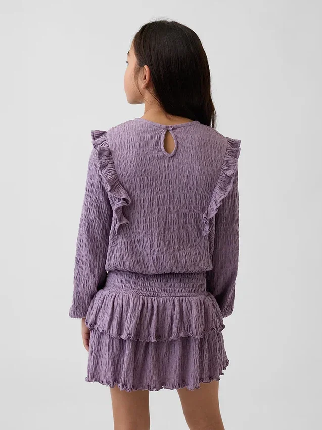 Blusa infantil de punto arrugado con volantes
