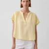 Blusa oversize de gasa de algodón con cuello abierto