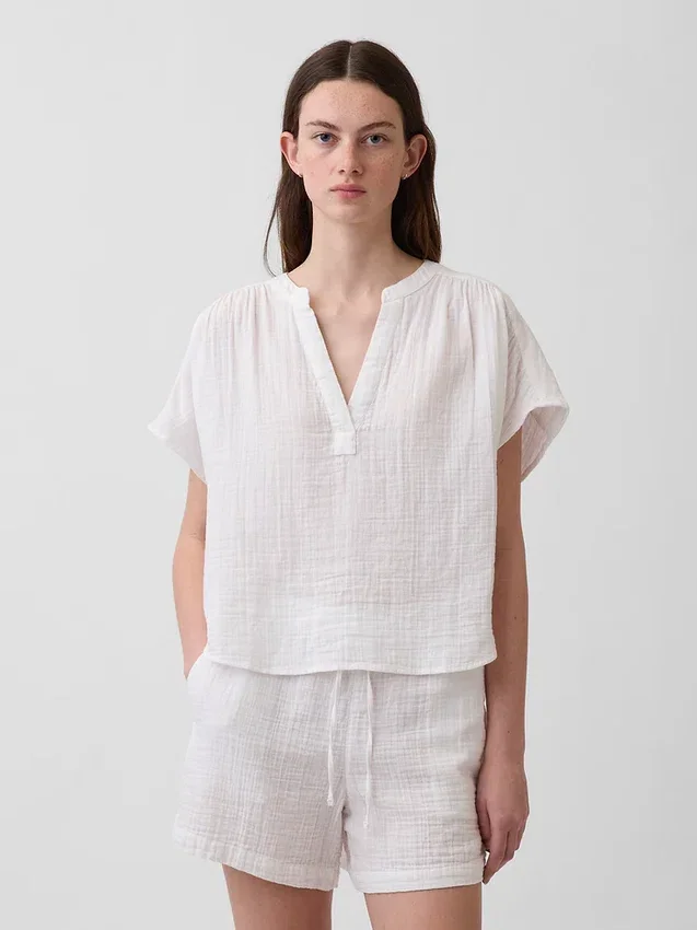 Blusa oversize de gasa de algodón con cuello abierto