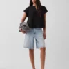 Blusa oversize de gasa de algodón con cuello abierto