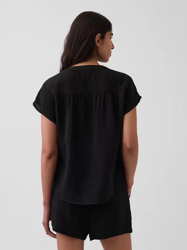 Blusa oversize de gasa de algodón con cuello abierto