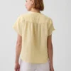 Blusa oversize de gasa de algodón con cuello abierto