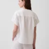 Blusa oversize de gasa de algodón con cuello abierto