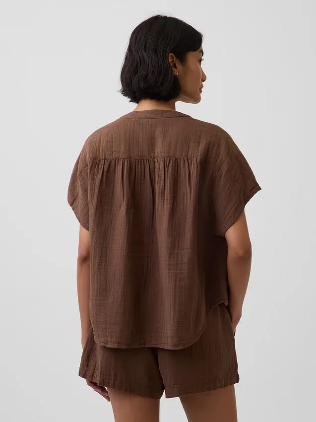 Blusa oversize de gasa de algodón con cuello abierto