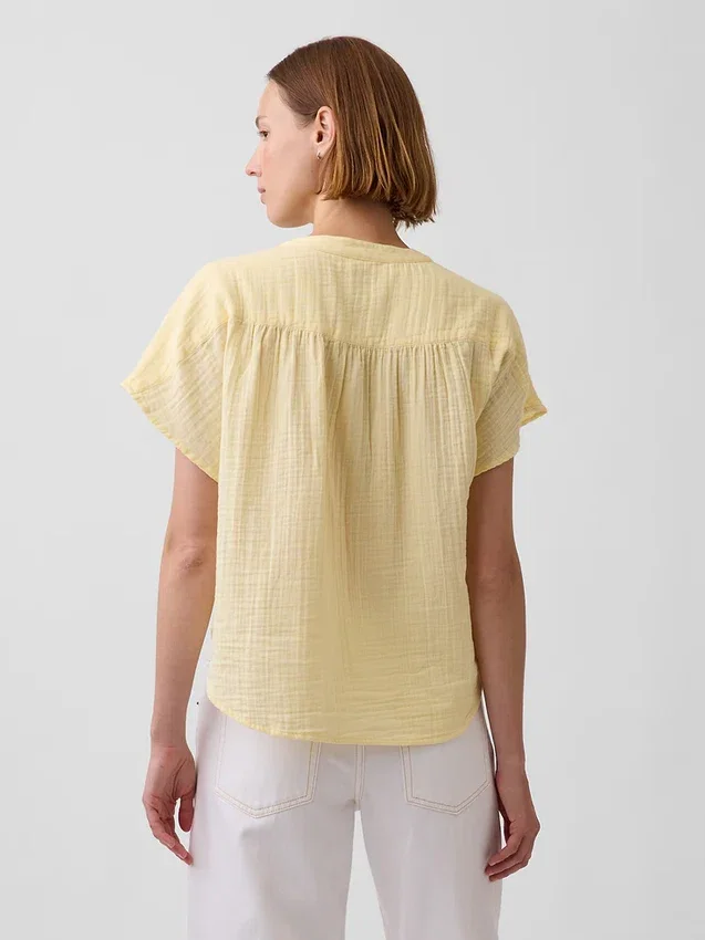 Blusa oversize de gasa de algodón con cuello abierto