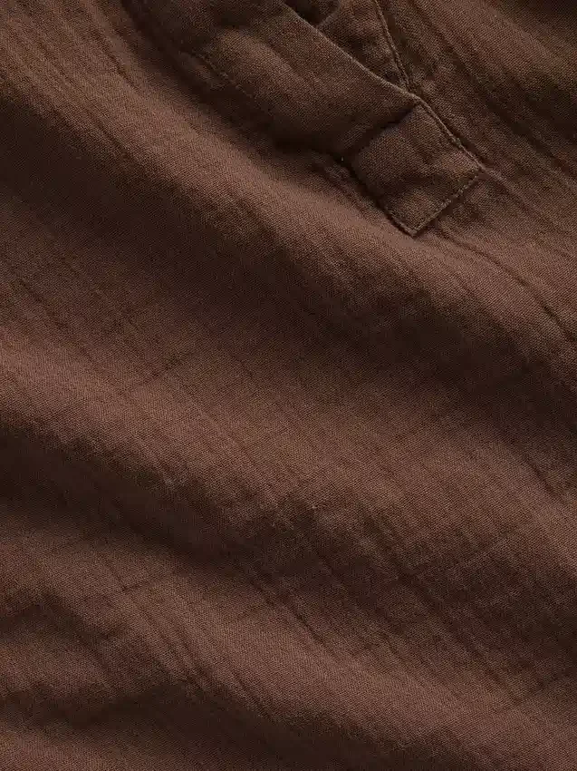 Blusa oversize de gasa de algodón con cuello abierto