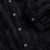 Blusa transparente con inserciones de encaje reciclado y cuello con lazo