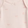 Body con moño de algodón orgánico «Baby First Favorites»