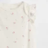 Body de algodón orgánico con mangas onduladas de la colección «Baby First Favorites»