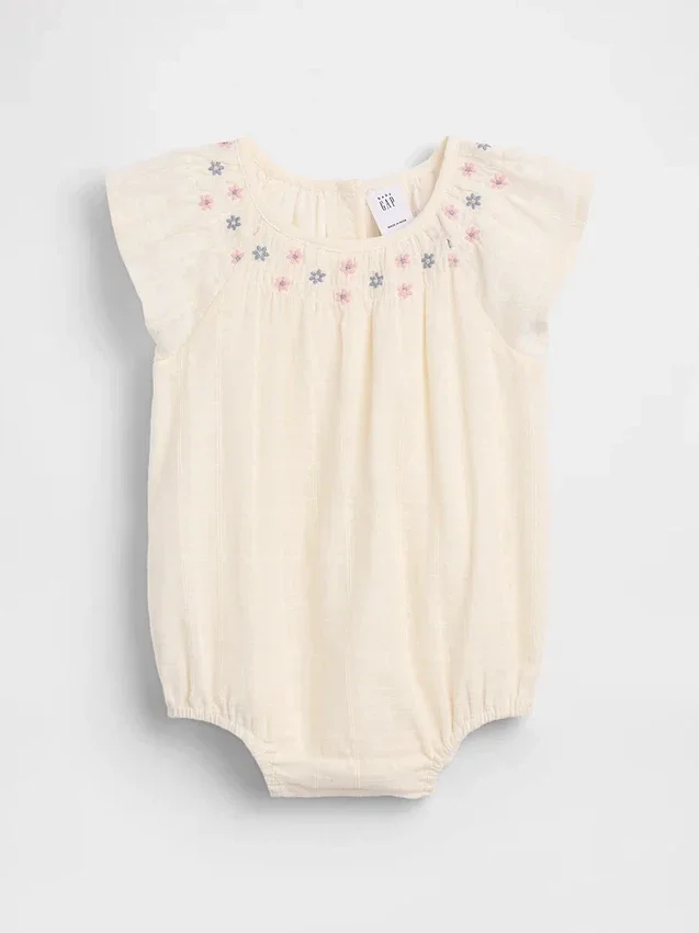 Body floral con fruncidos para bebé