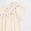 Body floral con fruncidos para bebé