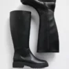 Botas altas de cuero vegano con suela de tacos