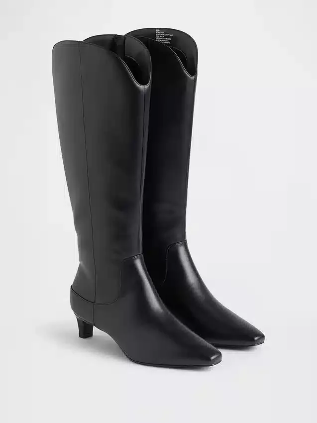 Botas altas hasta la rodilla con tacón bajo y punta afilada