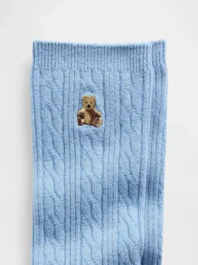 Calcetines de cuello alto con tejido trenzado y el oso Brannan