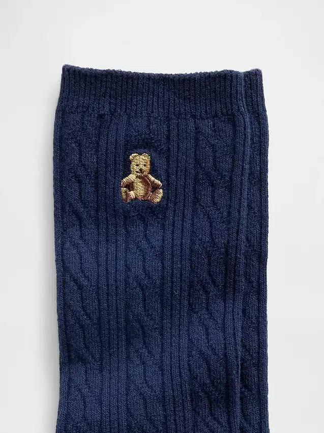 Calcetines de cuello alto con tejido trenzado y el oso Brannan