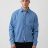Camisas de mezclilla de corte holgado y dobladillo recto