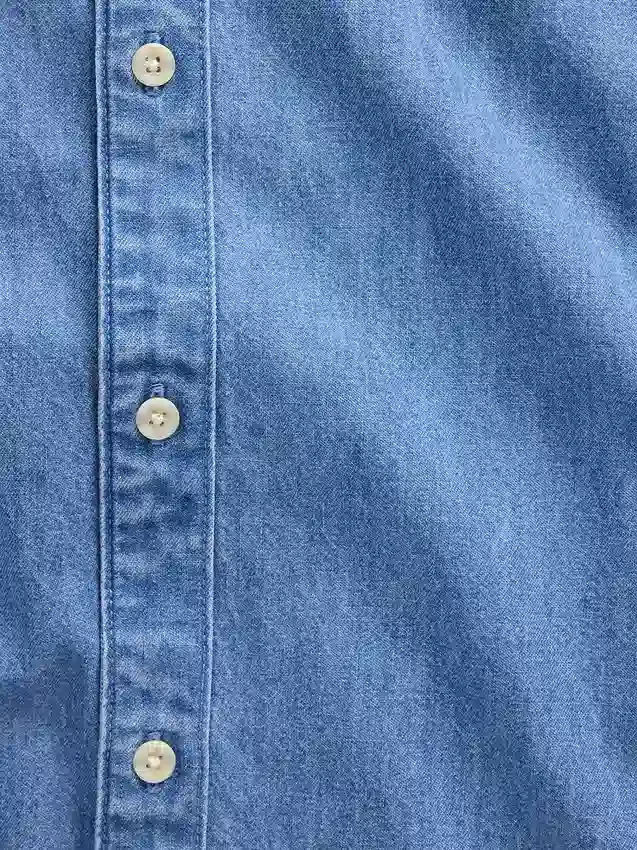 Camisas de mezclilla de corte holgado y dobladillo recto