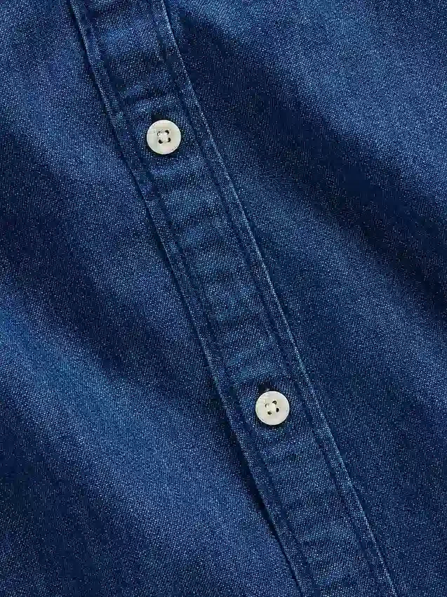 Camisas de mezclilla de corte holgado y dobladillo recto
