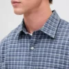 Camisas Oxford de corte relajado y largo corto con dobladillo recto