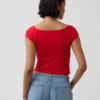 Camiseta corta de jersey de punto tupido con hombros al aire