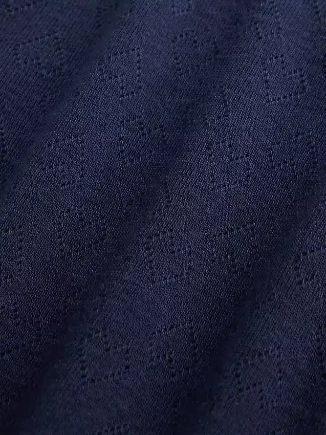Camiseta de pijama para niños de punto calado reciclado
