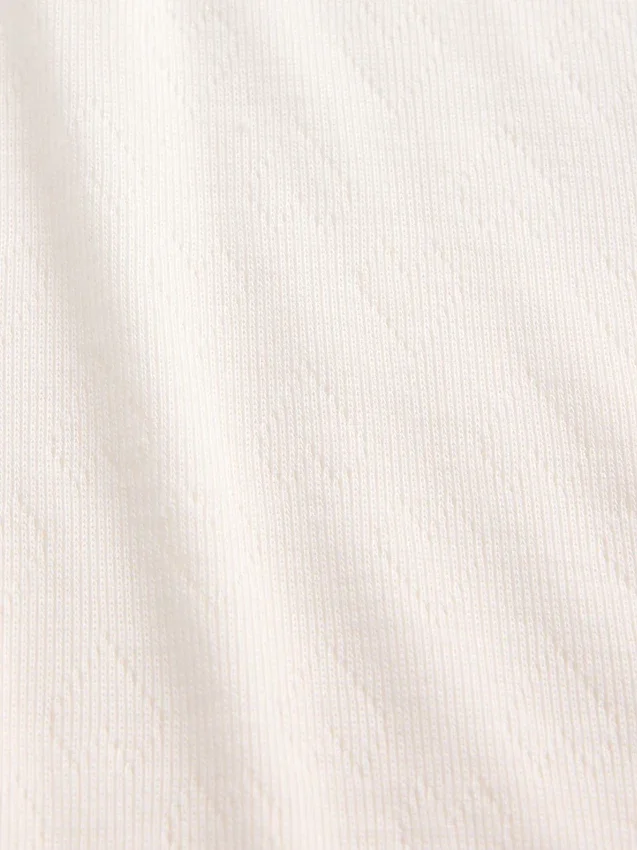 Camiseta de pijama para niños de punto calado reciclado