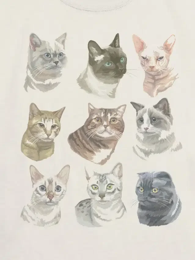 Camiseta infantil con diseño de caras de gatos