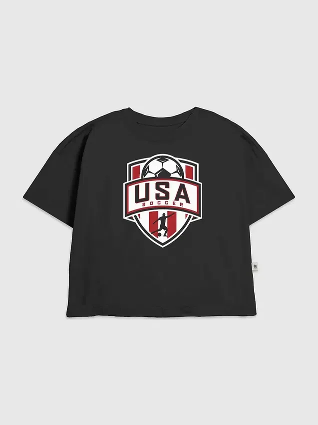 Camiseta infantil con diseño de escudo de fútbol de EE. UU.