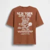 Camiseta infantil holgada con diseño gráfico