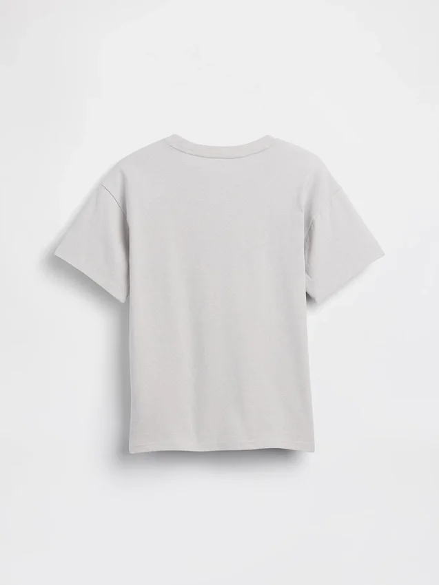 Camiseta infantil holgada con diseño gráfico