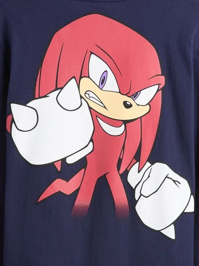 Camiseta infantil holgada con diseño gráfico