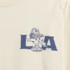 Camiseta infantil holgada con diseño gráfico