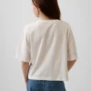 Camiseta infantil oversize con logo gráfico
