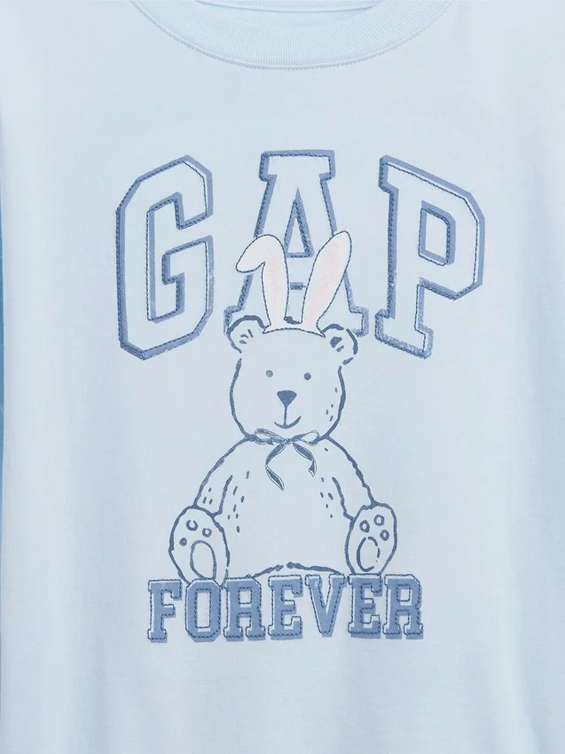 Camiseta infantil oversize con logo gráfico