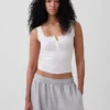 Camiseta sin mangas de pijama tipo Henley con encaje de canalé fino