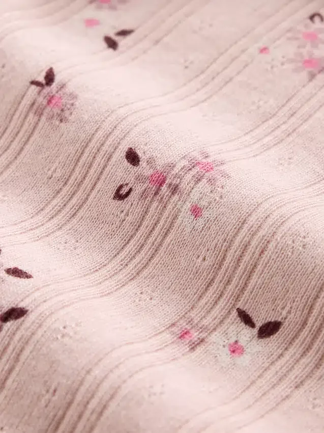 Cardigan infantil de punto acanalado con punto calado