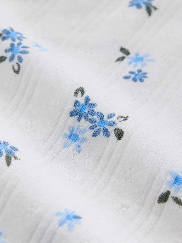 Cardigan infantil de punto acanalado con punto calado