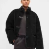 Chaqueta de sherpa reciclado con ribetes de cuero vegano