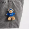 Colgante para bolso con capucha de siesta del oso Brannan