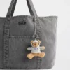 Colgante para bolso con diseño de sudadera Brannan Bear
