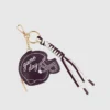 Colgante para bolso con forma de casco de Shiraleah